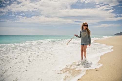 Girl with Shell Strand in Ocean