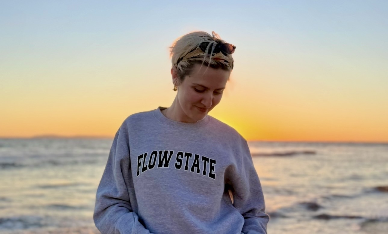 young person wearing a Flow State sweatshirt